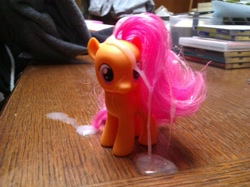Size: 2559x1919 | Tagged: explicit, scootaloo, brushable, cum, cum on toy, foalcon, g4, imported from derpibooru, irl, merch sexploitation, photo, pony, toy