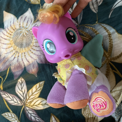Size: 1600x1600 | Tagged: safe, baby, baby daze (so soft newborn), baby pony, bedroom, blue wings, clothes, cute, diadazes, diaper, doll, female, filly, foal, g4, g4 logo, hand, human, imported from derpibooru, indoors, irl, logo, my little pony logo, newborn, pegasus, photo, pony, shirt, so soft, so soft newborn sunny daze, sunny daze (so soft newborn), touching, toy, wings