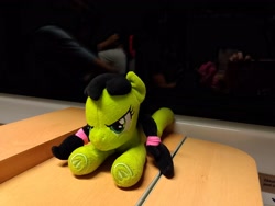 Size: 3264x2448 | Tagged: safe, artist:cleverscreenname, oc, oc:filly anon, braid, earth pony, earth pony oc, female, filly, foal, imported from derpibooru, lying down, oc only, photo, plushie, pony, prone, solo
