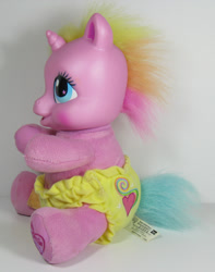 Size: 472x600 | Tagged: safe, photographer:breyer600, babity (g3), baby, baby pony, bandage, cute, cutie mark diapers, diaper, diaperity (g3), diarares, electronic toy, female, filly, foal, g3, high res, horn, imported from derpibooru, irl, make me better with rarity the unicorn, photo, pony, rarity (g3), so soft, starry eyes, toy, unicorn, wingding eyes