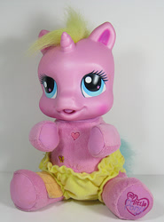 Size: 445x600 | Tagged: safe, photographer:breyer600, babity (g3), baby, baby pony, bandage, butterfly, cute, diaper, diaperity (g3), diarares, electronic toy, female, filly, foal, g3, heart, high res, horn, imported from derpibooru, irl, make me better with rarity the unicorn, photo, pony, rarity (g3), so soft, starry eyes, toy, unicorn, wingding eyes