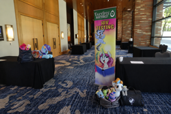 Size: 1536x1024 | Tagged: safe, fluttershy, twilight sparkle, oc, oc:filly anon, derpy hooves, diamond mint, edit, everfree northwest, everfree northwest 2026, female, filly, foal, g4, imported from derpibooru, indoors, kirin, photo, plushie, twiggie