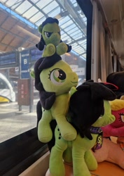 Size: 2830x4000 | Tagged: safe, artist:cleverscreenname, oc, oc:filly anon, female, filly, foal, imported from derpibooru, irl, oc only, photo, plushie, train, train station