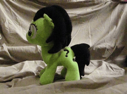 Size: 640x480 | Tagged: safe, oc, oc:filly anon, animated, female, filly, foal, imported from derpibooru, irl, kick in the butt, kicking, oc only, photo, plushie, webm