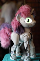 Size: 4000x6000 | Tagged: safe, artist:nembo, photographer:nembo, sweetie belle, 2026, craft, female, filly, fluffy mane, fluffy tail, foal, g4, glowing, glowing eyes, horn, imported from derpibooru, irl, photo, pony, robot, robot pony, solo, strelkafest, sweetie bot, sweetie bot project, tail, unicorn