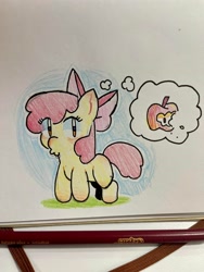 Size: 2494x3325 | Tagged: safe, artist:barbedbetty, apple bloom, apple, bitten apple, blushing, bow, earth pony, female, filly, foal, food, full body, g4, hair bow, imported from derpibooru, pencil, photo, pink bow, pony, solo, thought bubble, traditional art